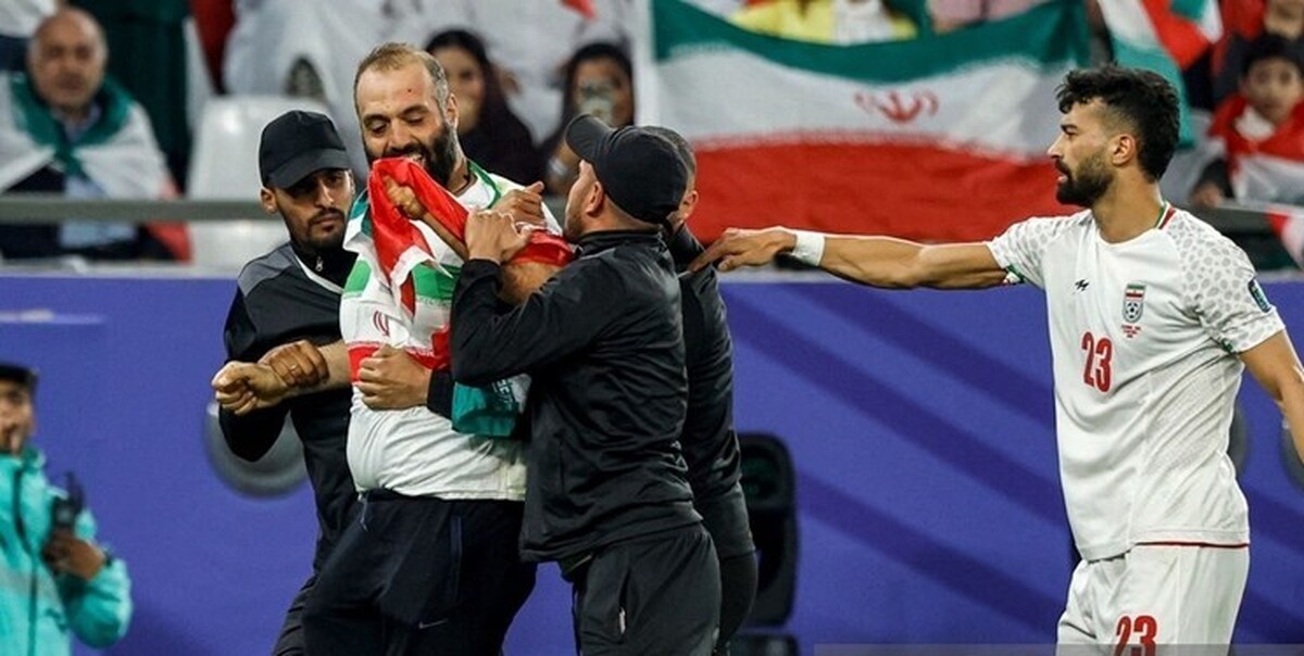 (عکس) به خاطر این هوادار جنجالی ایران ۳۰۰۰ دلار جریمه شد!